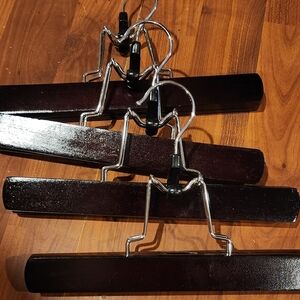 Dark wood skirt slacks hangers
